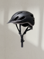 Animated image showing a bike helmet rotating clockwise around a central image of a cyclist, then moving into an empty space in a retailer catalog. The words 'Connect, Share, Sell' rotate to demonstrate how suppliers use Shopify Collective to connect and share products with retailers who import and sell them.