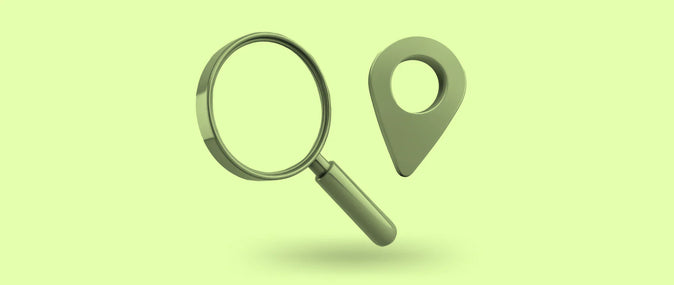 magnify glass and geolocation icon to indicate location based marketing