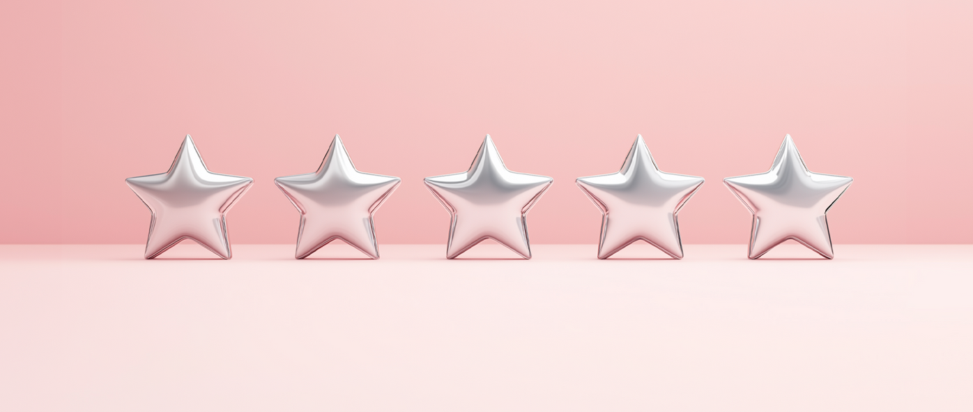 Silver star shaped balloons on a light pink background: customer experience design.