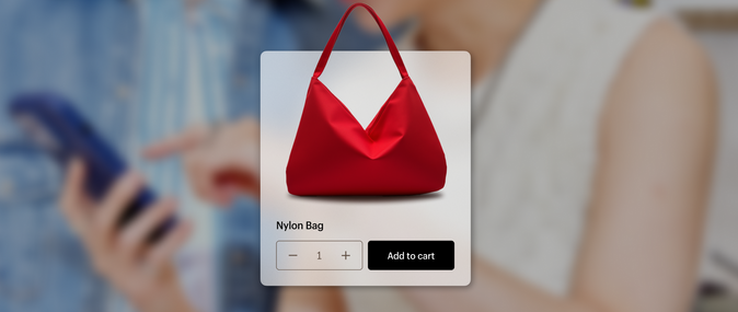 A red nylon purse being selected to add to cart: ecommerce website features.