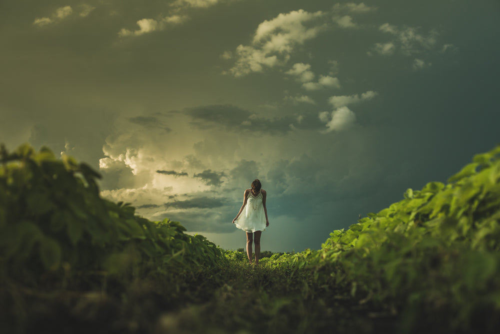 prairie woman at sunset