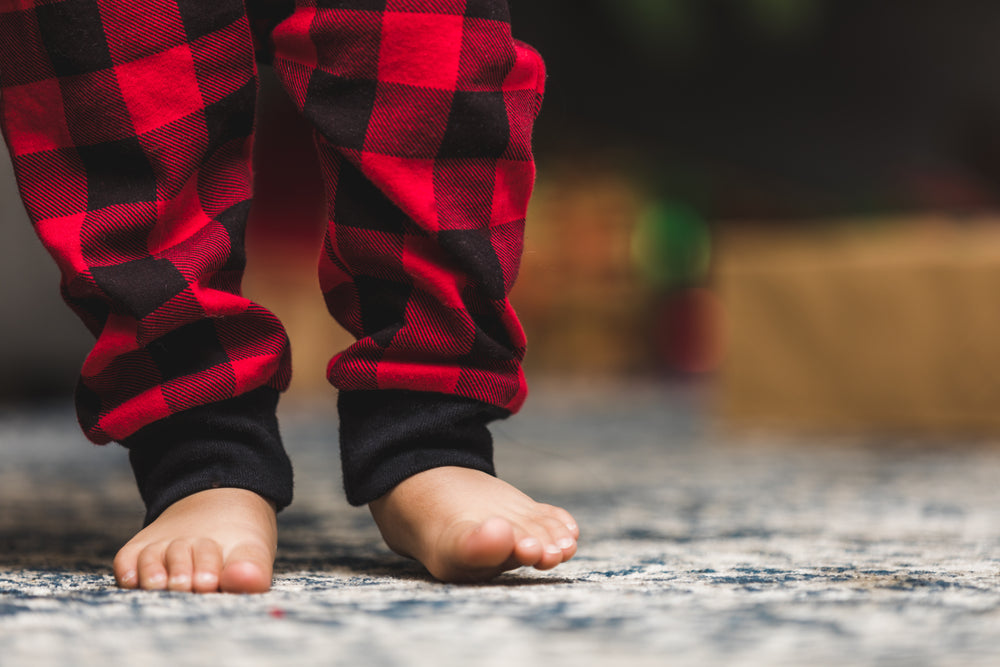 baby feet on christmas morning