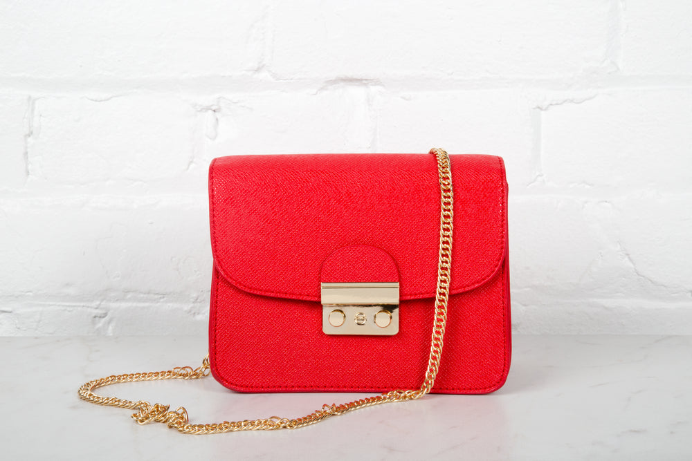 bright red purse with gold