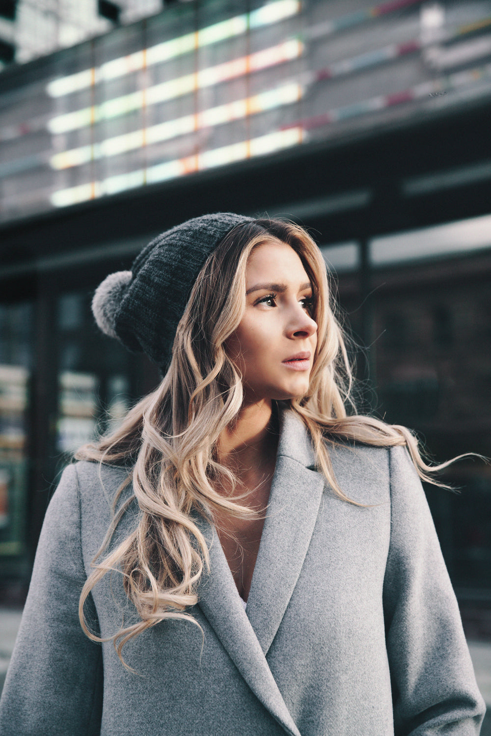 business woman with wool hat