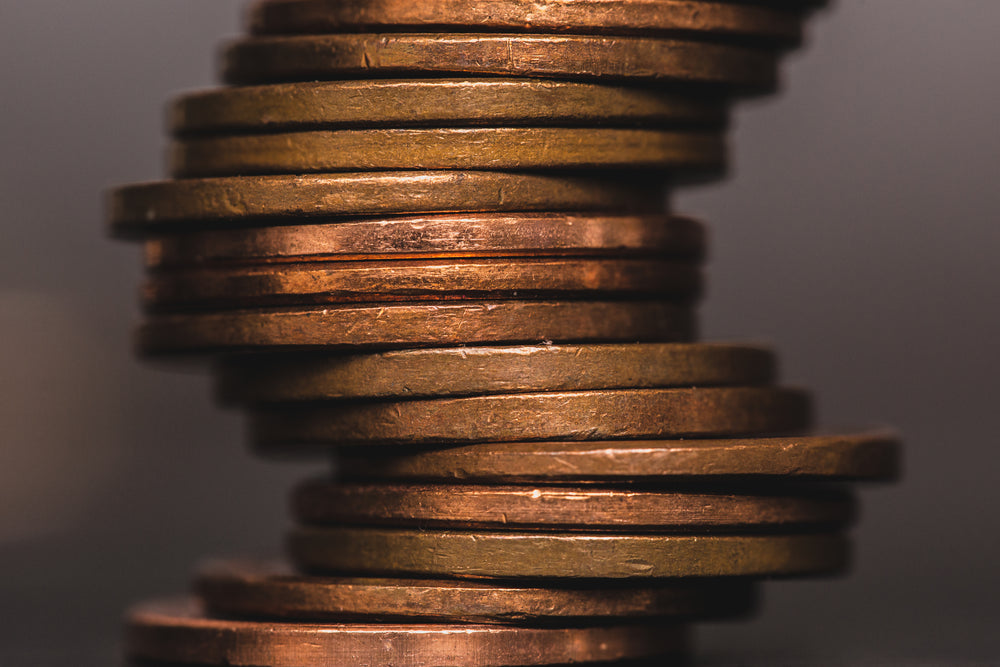 coins stacked in crooked pile