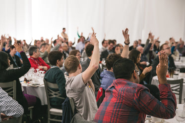 crowd participating at event