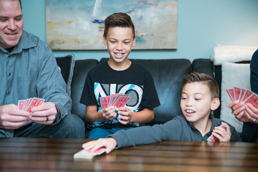 family playing cards