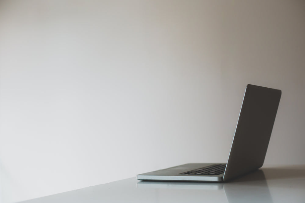 laptop in an empty room