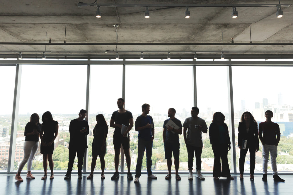 large group standing in office