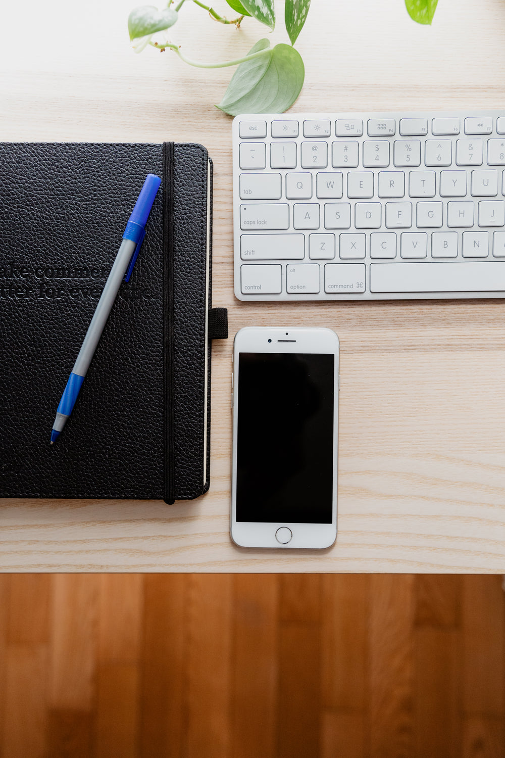 leather bound journal and mobile phone