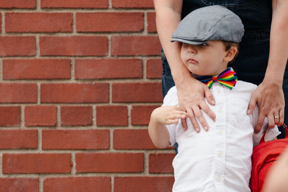 little boy ready for school with mom