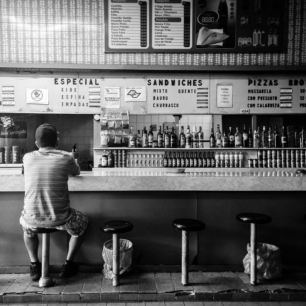 man at diner counter