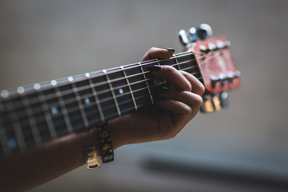 musician playing guitar