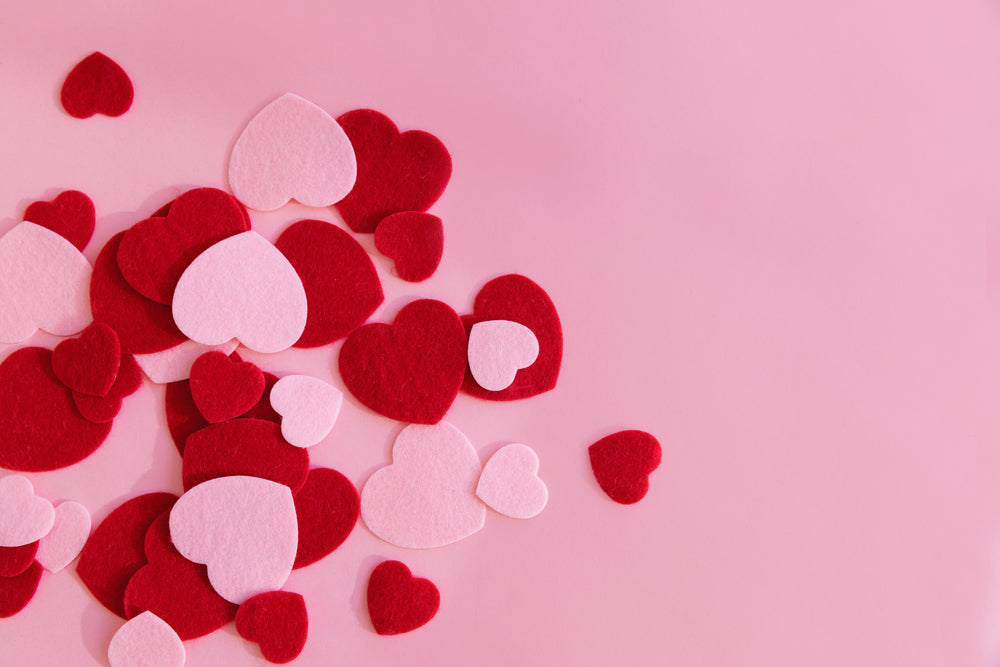 pink and red hearts on a pink surface