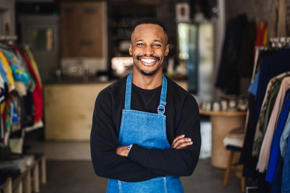 portrait of store owner in his store