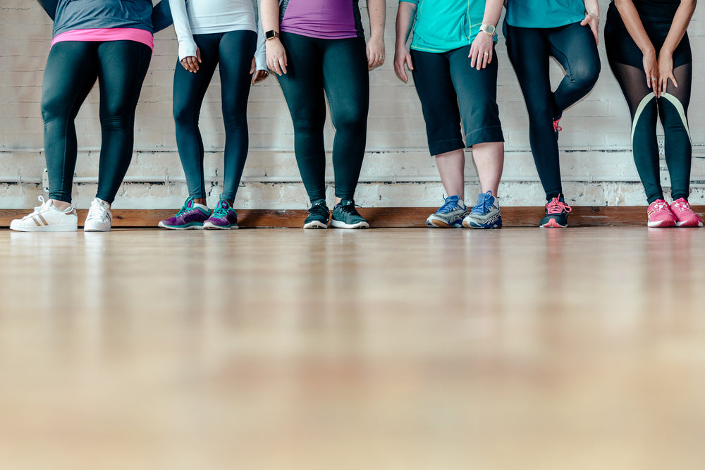 six women in fit gear legs