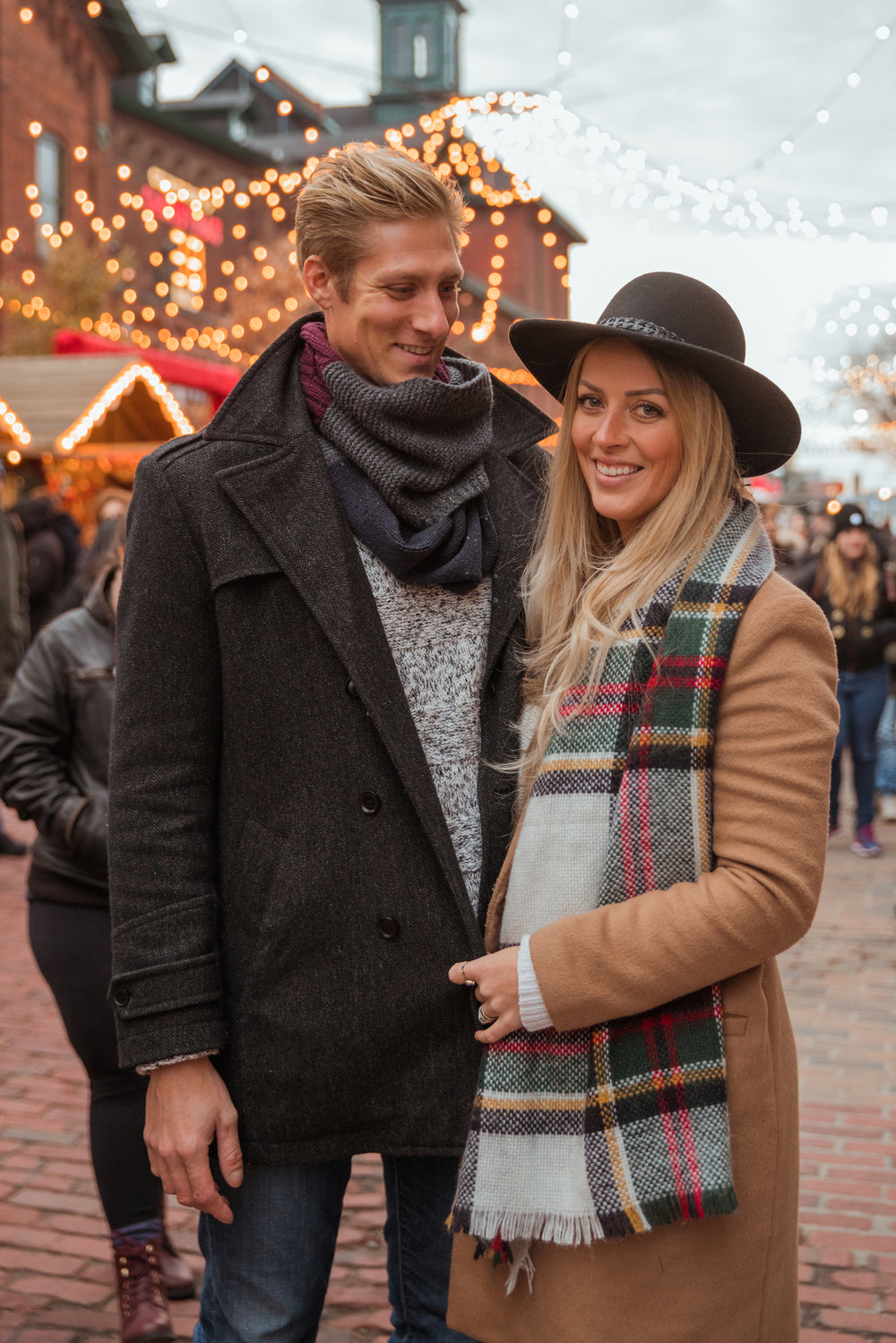 smiling couple holiday market