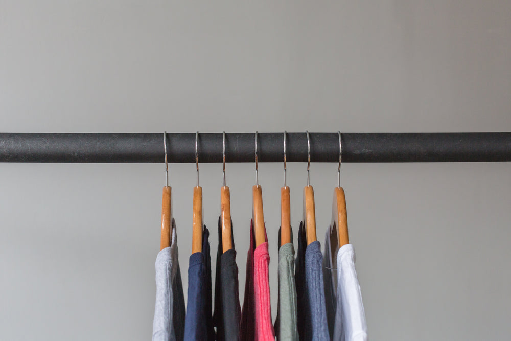 t shirts hanging on rack