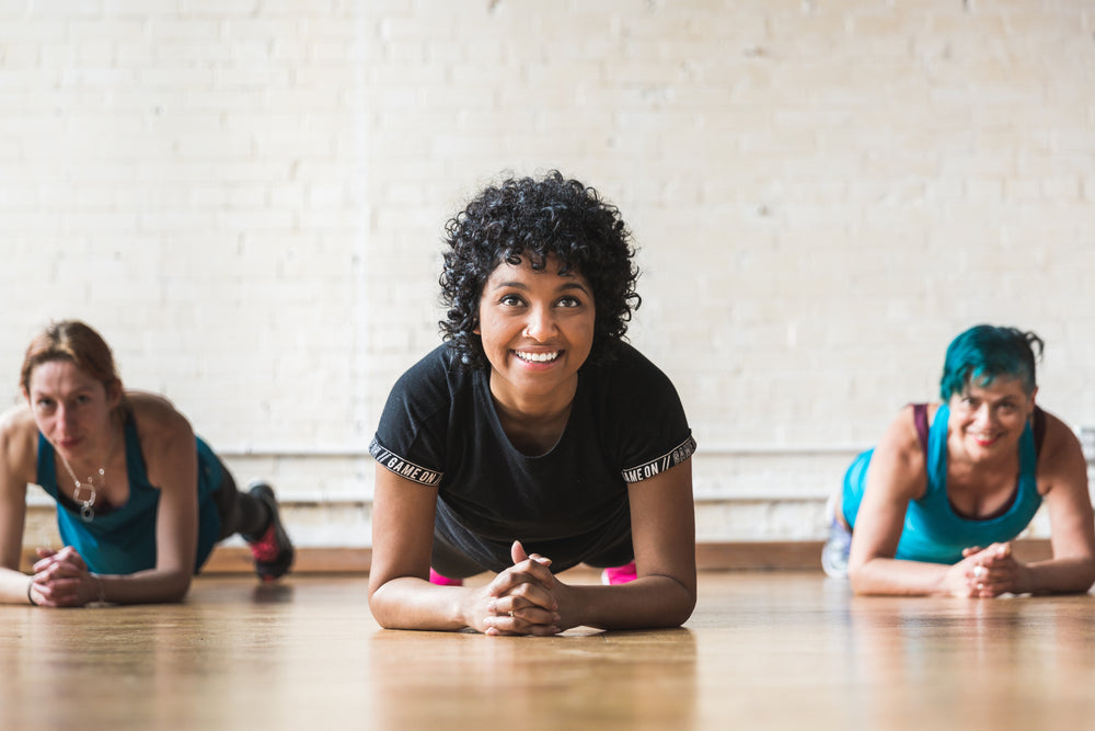 three women plank pose