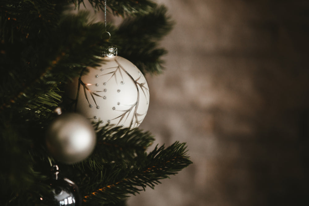 white and silver christmas ball ornament