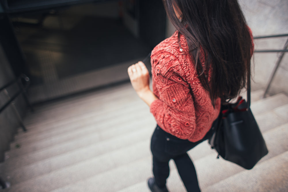 woman going down stairs