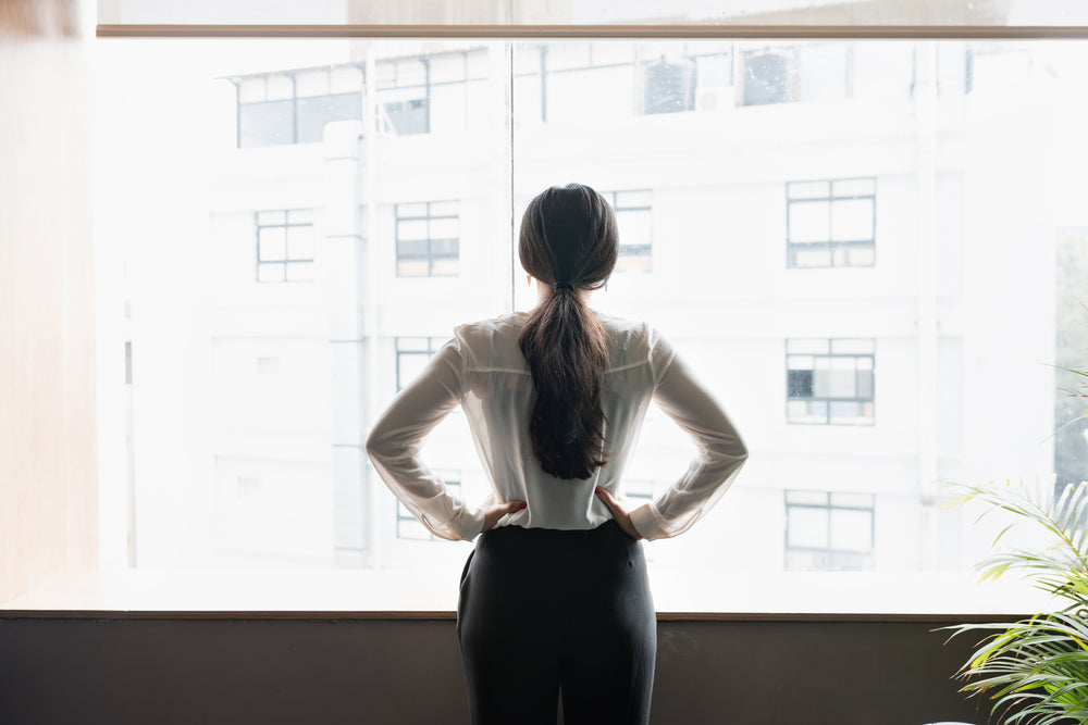 young woman taking stock of her surroundings